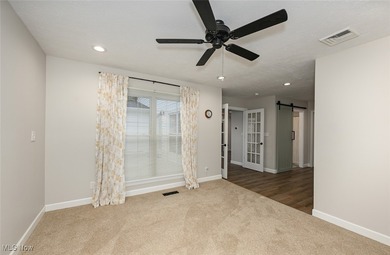 This beautifully designed and updated ranch residence features 2 on Ohio Prestwick Country Club in Ohio - for sale on GolfHomes.com, golf home, golf lot