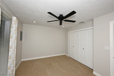 This beautifully designed and updated ranch residence features 2 on Ohio Prestwick Country Club in Ohio - for sale on GolfHomes.com, golf home, golf lot