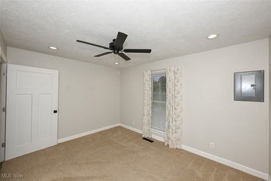 This beautifully designed and updated ranch residence features 2 on Ohio Prestwick Country Club in Ohio - for sale on GolfHomes.com, golf home, golf lot