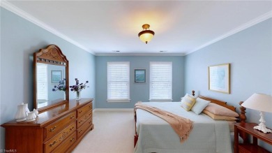 Enter the front door to view the beautiful great room w/stone on Salem Glen Country Club in North Carolina - for sale on GolfHomes.com, golf home, golf lot