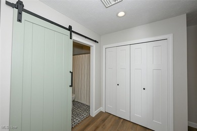 This beautifully designed and updated ranch residence features 2 on Ohio Prestwick Country Club in Ohio - for sale on GolfHomes.com, golf home, golf lot