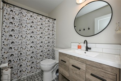 This beautifully designed and updated ranch residence features 2 on Ohio Prestwick Country Club in Ohio - for sale on GolfHomes.com, golf home, golf lot