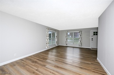 This beautifully designed and updated ranch residence features 2 on Ohio Prestwick Country Club in Ohio - for sale on GolfHomes.com, golf home, golf lot