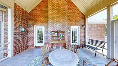 Enter the front door to view the beautiful great room w/stone on Salem Glen Country Club in North Carolina - for sale on GolfHomes.com, golf home, golf lot