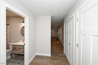 This beautifully designed and updated ranch residence features 2 on Ohio Prestwick Country Club in Ohio - for sale on GolfHomes.com, golf home, golf lot