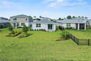 Entertain guests with ease in the open kitchen, dining, and on Babcock National Golf Course in Florida - for sale on GolfHomes.com, golf home, golf lot