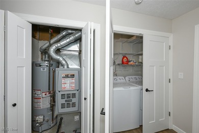 This beautifully designed and updated ranch residence features 2 on Ohio Prestwick Country Club in Ohio - for sale on GolfHomes.com, golf home, golf lot