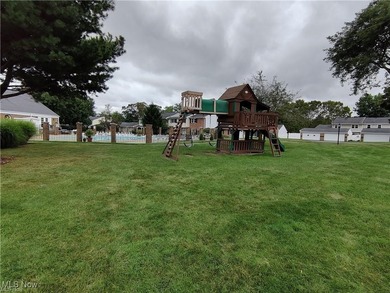 This beautifully designed and updated ranch residence features 2 on Ohio Prestwick Country Club in Ohio - for sale on GolfHomes.com, golf home, golf lot