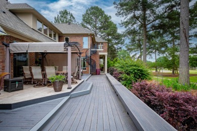 This luxury home w in-ground pool sits on a corner lot alongside on Centennial Valley Golf Course in Arkansas - for sale on GolfHomes.com, golf home, golf lot