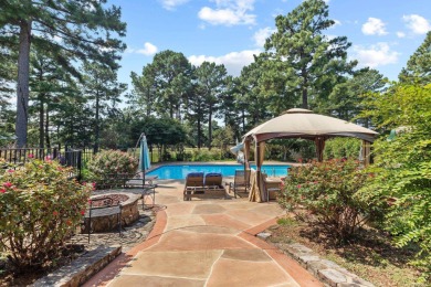 This luxury home w in-ground pool sits on a corner lot alongside on Centennial Valley Golf Course in Arkansas - for sale on GolfHomes.com, golf home, golf lot