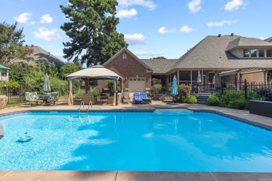 This luxury home w in-ground pool sits on a corner lot alongside on Centennial Valley Golf Course in Arkansas - for sale on GolfHomes.com, golf home, golf lot