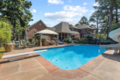 This luxury home w in-ground pool sits on a corner lot alongside on Centennial Valley Golf Course in Arkansas - for sale on GolfHomes.com, golf home, golf lot