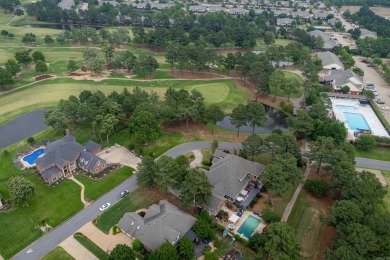 This luxury home w in-ground pool sits on a corner lot alongside on Centennial Valley Golf Course in Arkansas - for sale on GolfHomes.com, golf home, golf lot