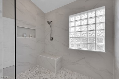 Beautifully remodeled pool home with stunning lake and golf on Burnt Store Golf Club in Florida - for sale on GolfHomes.com, golf home, golf lot