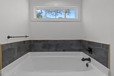 Situated on a quiet street in a desirable gated community, this on Deercroft Golf and Country Club in North Carolina - for sale on GolfHomes.com, golf home, golf lot