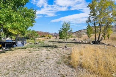 Perched overlooking the Ogden Valley and less than 5-miles from on Wolf Creek Golf Club and Resort in Utah - for sale on GolfHomes.com, golf home, golf lot