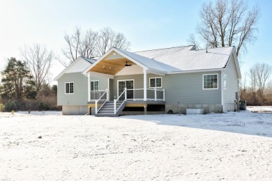 CURRENTLY UNDER CONSTRUCTION! This future home sits on 1.36 on Leaning Tree Golf Club in Michigan - for sale on GolfHomes.com, golf home, golf lot