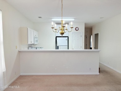 Charming Fixer-Upper with Scenic Golf Views in Sunset Beach!

 on Sandpiper Bay Golf and Country Club in North Carolina - for sale on GolfHomes.com, golf home, golf lot