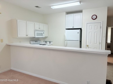 Charming Fixer-Upper with Scenic Golf Views in Sunset Beach!

 on Sandpiper Bay Golf and Country Club in North Carolina - for sale on GolfHomes.com, golf home, golf lot