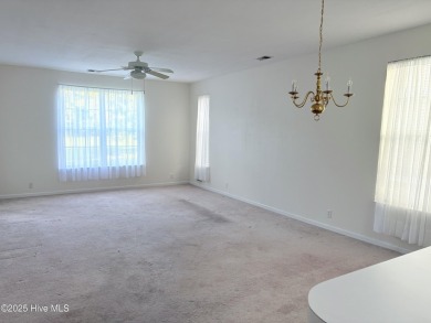 Charming Fixer-Upper with Scenic Golf Views in Sunset Beach!

 on Sandpiper Bay Golf and Country Club in North Carolina - for sale on GolfHomes.com, golf home, golf lot
