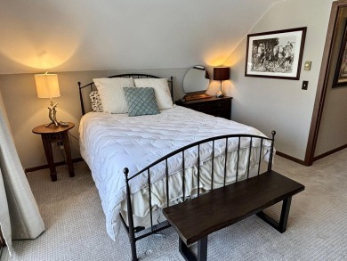 Private northern MI retreat! Renovated 1,428 sq ft chalet on 2 on The Loon Golf Resort in Michigan - for sale on GolfHomes.com, golf home, golf lot