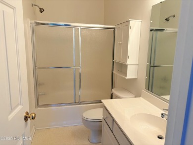 Charming Fixer-Upper with Scenic Golf Views in Sunset Beach!

 on Sandpiper Bay Golf and Country Club in North Carolina - for sale on GolfHomes.com, golf home, golf lot