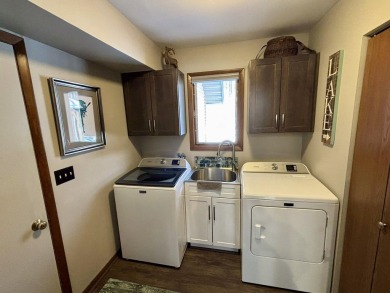Private northern MI retreat! Renovated 1,428 sq ft chalet on 2 on The Loon Golf Resort in Michigan - for sale on GolfHomes.com, golf home, golf lot