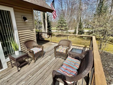 Private northern MI retreat! Renovated 1,428 sq ft chalet on 2 on The Loon Golf Resort in Michigan - for sale on GolfHomes.com, golf home, golf lot