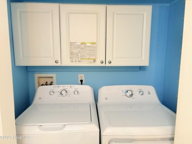 Charming Fixer-Upper with Scenic Golf Views in Sunset Beach!

 on Sandpiper Bay Golf and Country Club in North Carolina - for sale on GolfHomes.com, golf home, golf lot