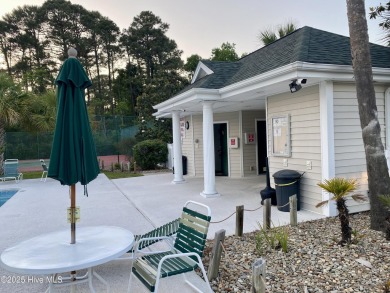 Charming Fixer-Upper with Scenic Golf Views in Sunset Beach!

 on Sandpiper Bay Golf and Country Club in North Carolina - for sale on GolfHomes.com, golf home, golf lot