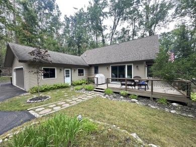 Private northern MI retreat! Renovated 1,428 sq ft chalet on 2 on The Loon Golf Resort in Michigan - for sale on GolfHomes.com, golf home, golf lot