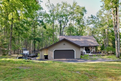 Private northern MI retreat! Renovated 1,428 sq ft chalet on 2 on The Loon Golf Resort in Michigan - for sale on GolfHomes.com, golf home, golf lot