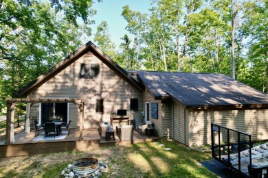 Private northern MI retreat! Renovated 1,428 sq ft chalet on 2 on The Loon Golf Resort in Michigan - for sale on GolfHomes.com, golf home, golf lot