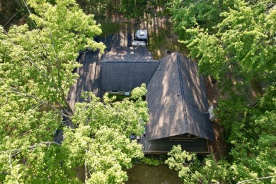 Private northern MI retreat! Renovated 1,428 sq ft chalet on 2 on The Loon Golf Resort in Michigan - for sale on GolfHomes.com, golf home, golf lot
