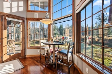 2140 Hunters Knob Road blends timeless masonry, elegant finishes on Raven Golf Club At Three Peaks in Colorado - for sale on GolfHomes.com, golf home, golf lot