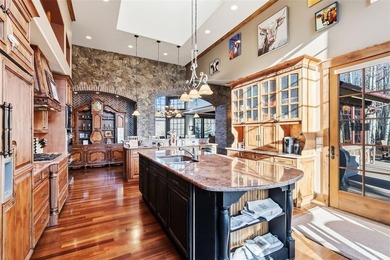 2140 Hunters Knob Road blends timeless masonry, elegant finishes on Raven Golf Club At Three Peaks in Colorado - for sale on GolfHomes.com, golf home, golf lot