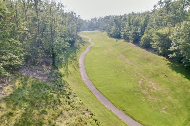 Private northern MI retreat! Renovated 1,428 sq ft chalet on 2 on The Loon Golf Resort in Michigan - for sale on GolfHomes.com, golf home, golf lot