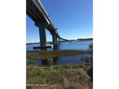 Charming Fixer-Upper with Scenic Golf Views in Sunset Beach!

 on Sandpiper Bay Golf and Country Club in North Carolina - for sale on GolfHomes.com, golf home, golf lot