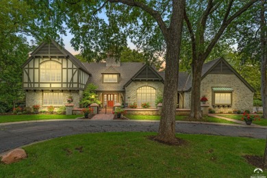 Welcome to this remarkable Tudor-style home situated on just on Alvamar Country Club in Kansas - for sale on GolfHomes.com, golf home, golf lot