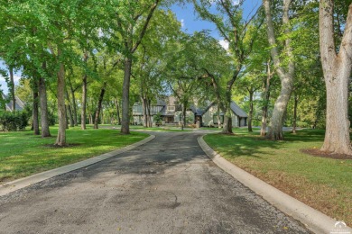 Welcome to this remarkable Tudor-style home situated on just on Alvamar Country Club in Kansas - for sale on GolfHomes.com, golf home, golf lot