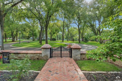 Welcome to this remarkable Tudor-style home situated on just on Alvamar Country Club in Kansas - for sale on GolfHomes.com, golf home, golf lot