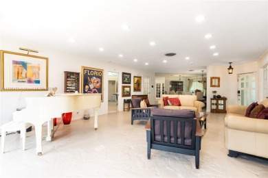 Welcome to this stunning 4 bed, 2.5-bath lakefront home located on Jacaranda Golf Club in Florida - for sale on GolfHomes.com, golf home, golf lot