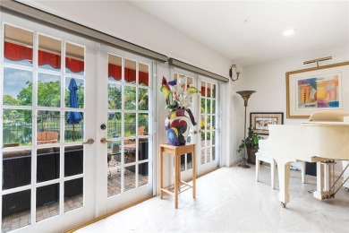 Welcome to this stunning 4 bed, 2.5-bath lakefront home located on Jacaranda Golf Club in Florida - for sale on GolfHomes.com, golf home, golf lot