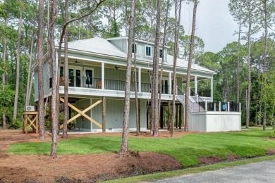 **Stunning New Home on Dauphin Island - A True Paradise Escape**
 on Isle Dauphine Club Golf Course in Alabama - for sale on GolfHomes.com, golf home, golf lot
