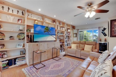 Welcome to this stunning 4 bed, 2.5-bath lakefront home located on Jacaranda Golf Club in Florida - for sale on GolfHomes.com, golf home, golf lot