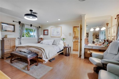 Welcome to this stunning 4 bed, 2.5-bath lakefront home located on Jacaranda Golf Club in Florida - for sale on GolfHomes.com, golf home, golf lot