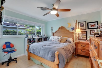 Welcome to this stunning 4 bed, 2.5-bath lakefront home located on Jacaranda Golf Club in Florida - for sale on GolfHomes.com, golf home, golf lot