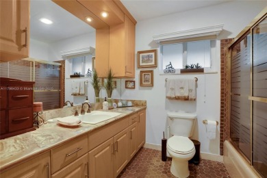 Welcome to this stunning 4 bed, 2.5-bath lakefront home located on Jacaranda Golf Club in Florida - for sale on GolfHomes.com, golf home, golf lot