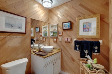 Welcome to this stunning 4 bed, 2.5-bath lakefront home located on Jacaranda Golf Club in Florida - for sale on GolfHomes.com, golf home, golf lot