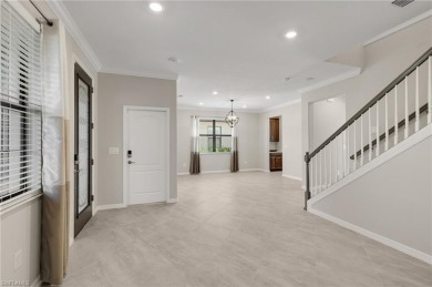 Discover refined luxury within the contemporary ambiance of this on Old Corkscrew Golf Club in Florida - for sale on GolfHomes.com, golf home, golf lot